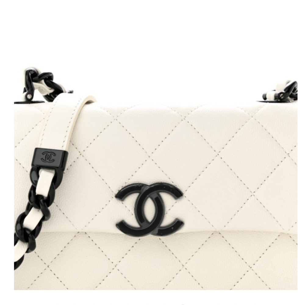 Chanel quilted caviar bag